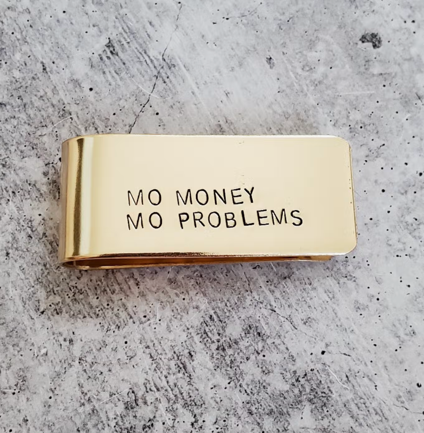 Plus d'argent, plus de problèmes, pince à billets