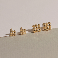 Studs en croix Lindsay Lewis