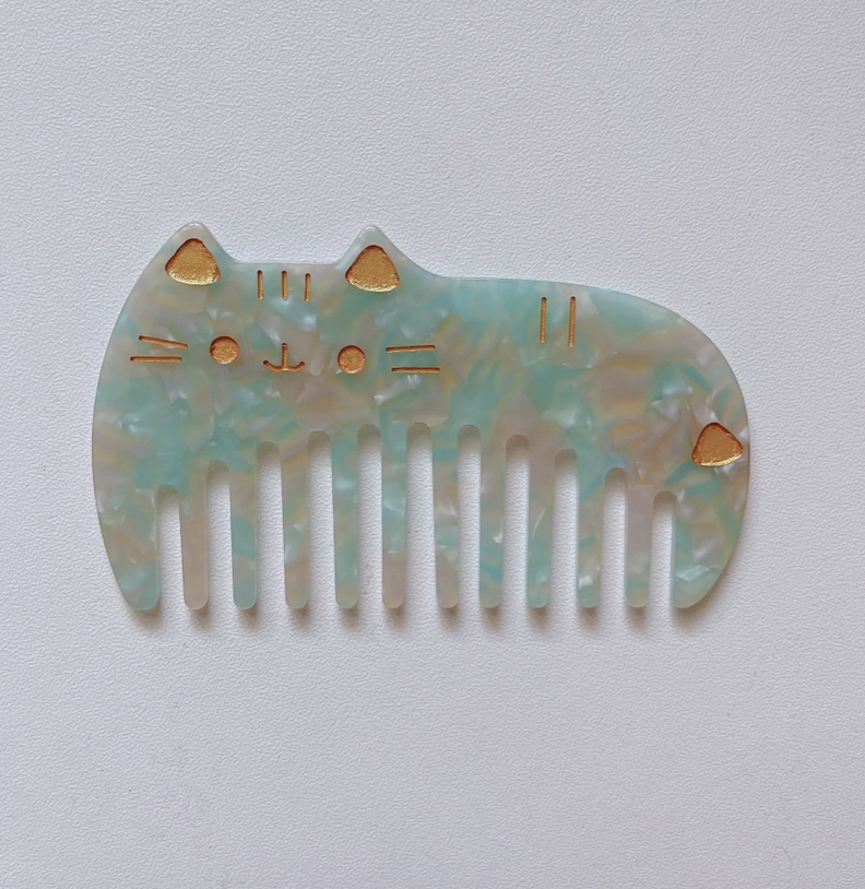 Peigne à dents larges pour chat mini