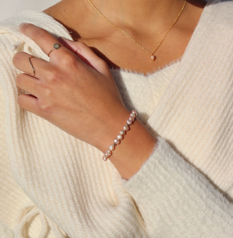 Bracelet en perles roses Token