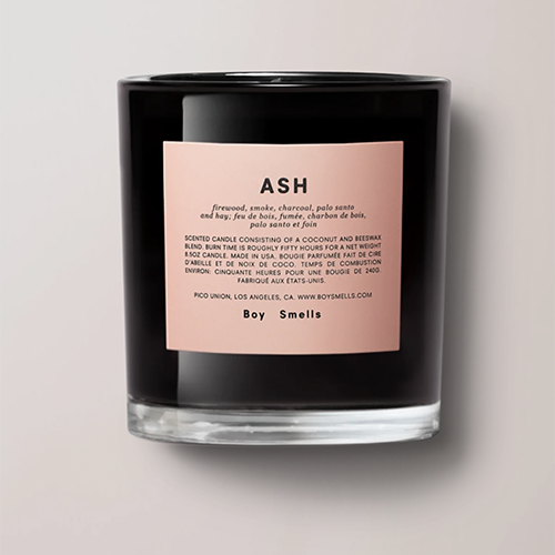 Boy Smells Ash Candle