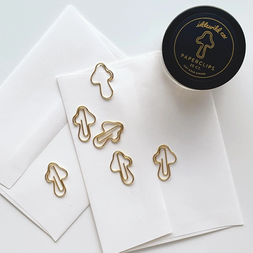 Trombones en papier plaqués or en forme de champignon