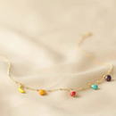 Collier en émail avec pendentif en forme de fruit