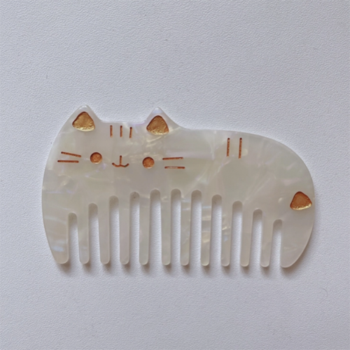 Peigne à dents larges pour chat mini