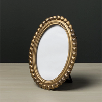 Oval Frame With Heart Detail