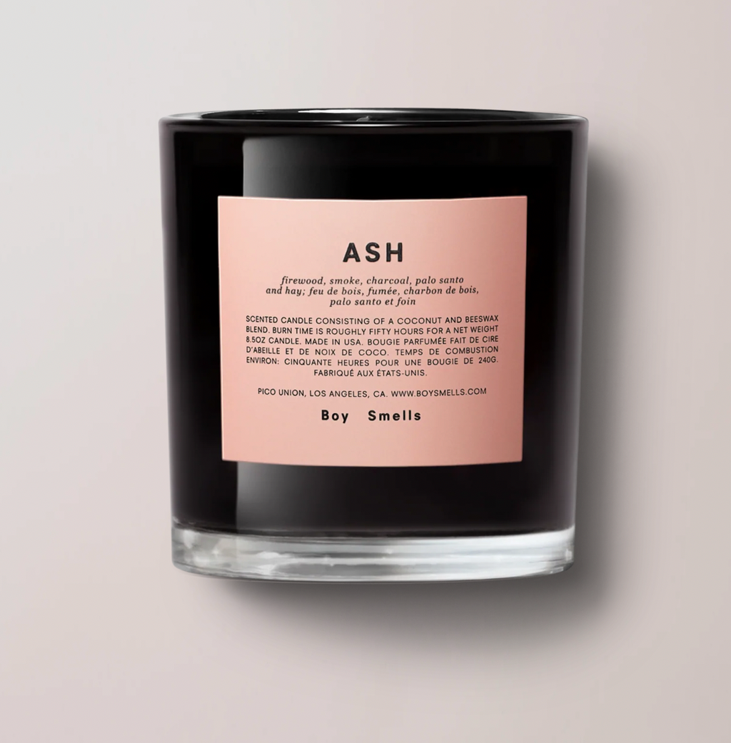 Boy Smells Ash Candle