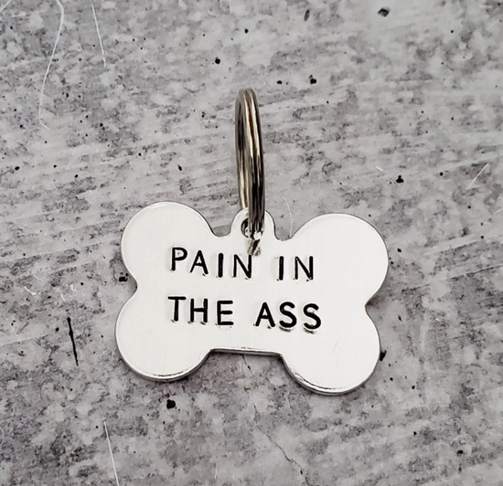 Douleur dans le cul Pet Tag